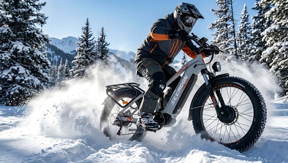 Seemoon SM3 AWD all terrain electric  bike riding dynamically through deep powder snow in a winter forest, demonstrating dual-motor traction.