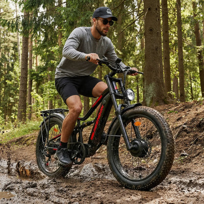 Seemoon SM8 electric bike riding through muddy off-road terrain