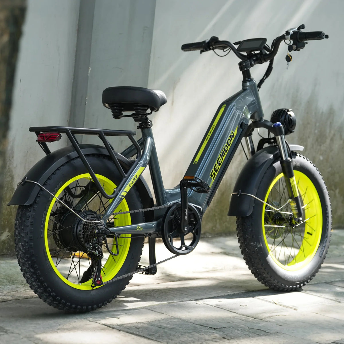 SM5 electric bike full view featuring fat tires, yellow rim accents, and a black frame